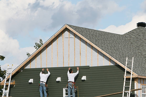 Professional Siding Installation technician working in Petersburg, IN